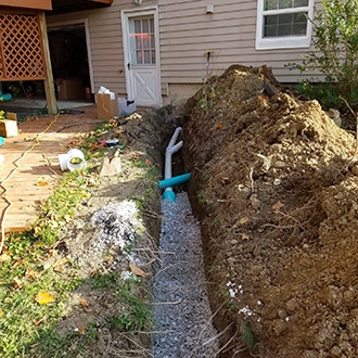 Piping being installed outside of a customer's house